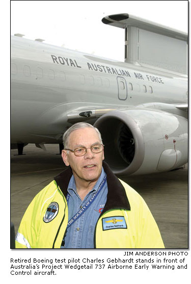 Charles Gebhardt standing in front of Australias Project Wedgetail 737 Airborne Early Warning and Control aircraft